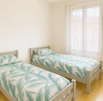 Un ou plusieurs lits dans un hébergement de l'établissement La Maison accueillante pour les pros et tourisme