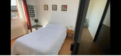 Un ou plusieurs lits dans un hébergement de l'établissement Hôtel Brasserie Le Lion d'Or