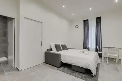Un ou plusieurs lits dans un hébergement de l'établissement GuestReady - 1-BR, 5 minutes from train station