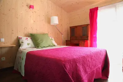 Un ou plusieurs lits dans un hébergement de l'établissement Maison Addama