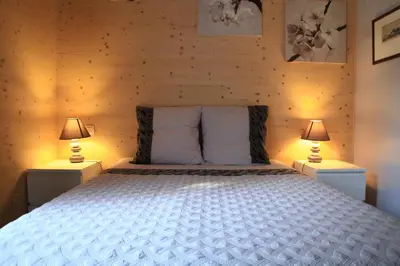 Un ou plusieurs lits dans un hébergement de l'établissement Maison Addama