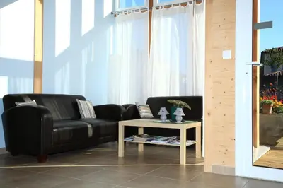 Coin salon dans l'établissement Maison Addama