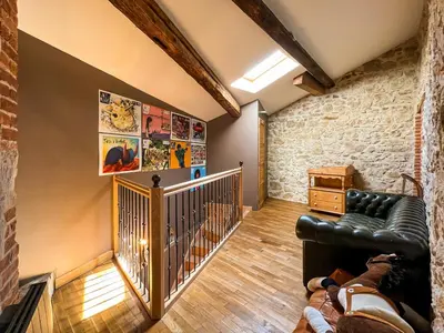 Coin salon dans l'établissement gite au chat bûcheron