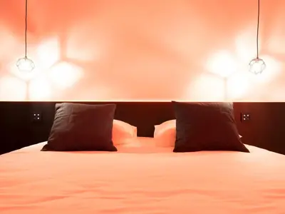 Un ou plusieurs lits dans un hébergement de l'établissement MiHotel Vieux Lyon