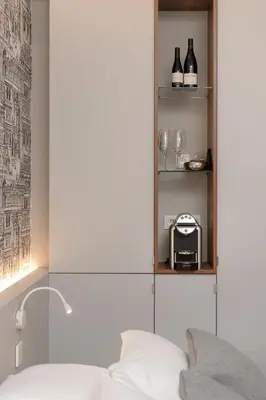 Un ou plusieurs lits dans un hébergement de l'établissement MiHotel Bizolon