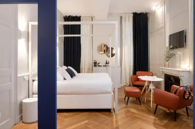 Un ou plusieurs lits dans un hébergement de l'établissement MiHotel Bizolon
