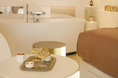 Un ou plusieurs lits dans un hébergement de l'établissement MiHotel Comte