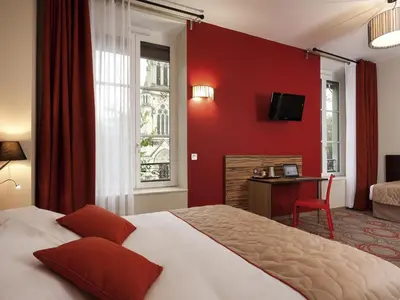 Un ou plusieurs lits dans un hébergement de l'établissement Aparthotel Adagio Lyon Patio Confluence