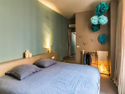 Un ou plusieurs lits dans un hébergement de l'établissement MiHotel Bellecour