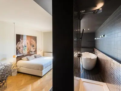 Un ou plusieurs lits dans un hébergement de l'établissement MiHotel Bellecour