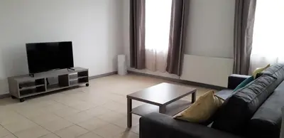 Télévision ou salle de divertissement dans l'établissement Appart comme chez soi