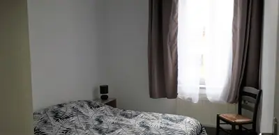 Un ou plusieurs lits dans un hébergement de l'établissement Appart comme chez soi