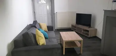 Télévision ou salle de divertissement dans l'établissement Appart comme chez soi