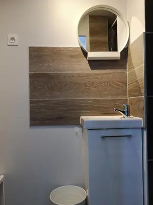 Salle de bains dans l'établissement Immeuble La DOA proche CHU