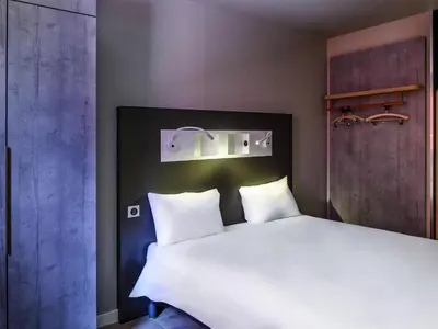 Un ou plusieurs lits dans un hébergement de l'établissement ibis budget Saint-Étienne Centre Gare Châteaucreux