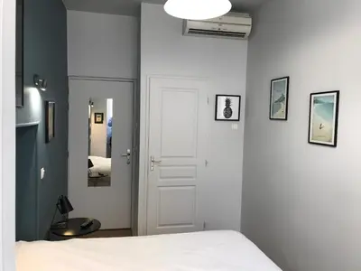 Un ou plusieurs lits dans un hébergement de l'établissement Lyo Hôtel - Centre Lyon Perrache