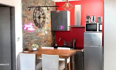 Cuisine ou kitchenette dans l'établissement Chez Muriella & Marco