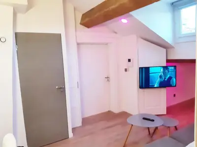 Télévision ou salle de divertissement dans l'établissement Chez Muriella & Marco