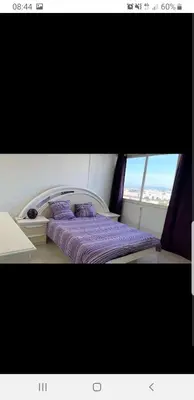 Un ou plusieurs lits dans un hébergement de l'établissement Appartement Laurent Bonnevay
