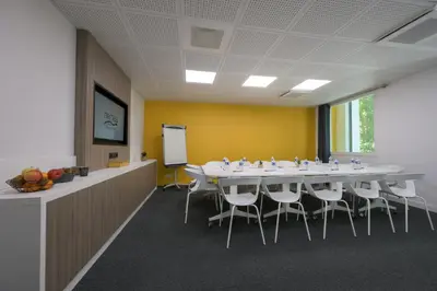 Espace de conférence ou salle de réunion dans l'établissement Nemea Appart Hotel So Cloud Lyon Gare Part-Dieu