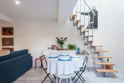 Coin salon dans l'établissement Grand duplex au calme en centre-ville