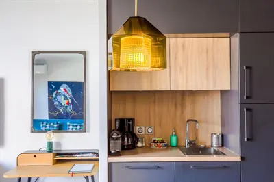 Cuisine ou kitchenette dans l'établissement Lyon Premium - 7e Ciel Rooftop Panoramique