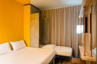 Un ou plusieurs lits dans un hébergement de l'établissement ibis budget Lyon Est Beynost