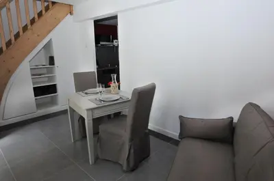 Coin salon dans l'établissement Les Communs du Manoir