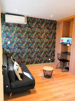 Télévision ou salle de divertissement dans l'établissement Studio Design Paraisos