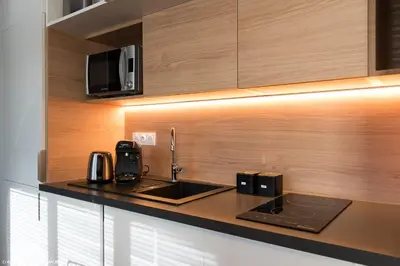 Cuisine ou kitchenette dans l'établissement Le Juliette