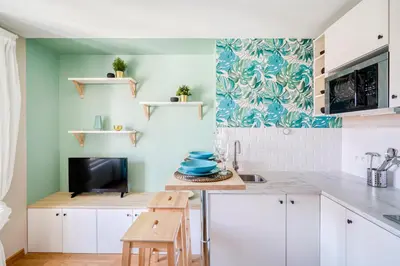 Cuisine ou kitchenette dans l'établissement HONORÊ - Suite Carnot