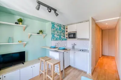 Cuisine ou kitchenette dans l'établissement HONORÊ - Suite Carnot