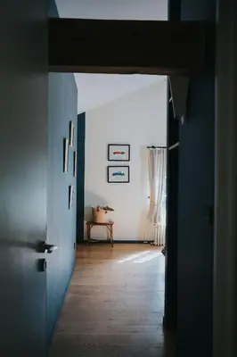 Un ou plusieurs lits dans un hébergement de l'établissement Lyon Country House - Suites & Tour de Garde