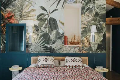 Un ou plusieurs lits dans un hébergement de l'établissement Lyon Country House - Suites & Tour de Garde