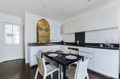 Cuisine ou kitchenette dans l'établissement Appartement Tromba - Welkeys
