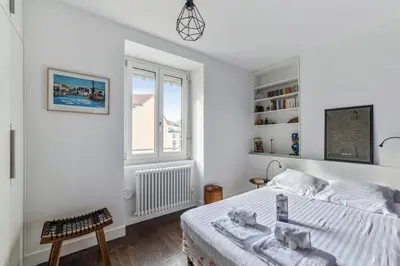 Un ou plusieurs lits dans un hébergement de l'établissement Appartement Tromba - Welkeys
