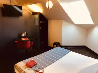 Un ou plusieurs lits dans un hébergement de l'établissement Best Western Bridge Hotel Lyon East
