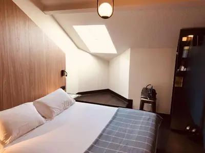 Un ou plusieurs lits dans un hébergement de l'établissement Best Western Bridge Hotel Lyon East
