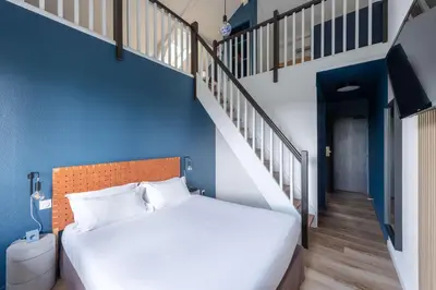 Un ou plusieurs lits dans un hébergement de l'établissement Best Western Bridge Hotel Lyon East
