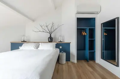 Un ou plusieurs lits dans un hébergement de l'établissement Best Western Bridge Hotel Lyon East