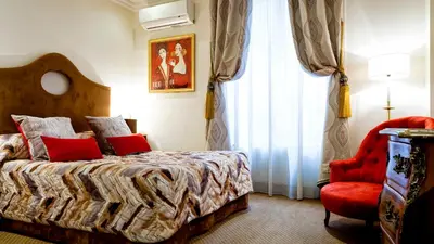 Un ou plusieurs lits dans un hébergement de l'établissement Grand Hotel des Terreaux