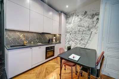 Cuisine ou kitchenette dans l'établissement La Suite en Rose - Spa - Lyon Centre Brotteaux