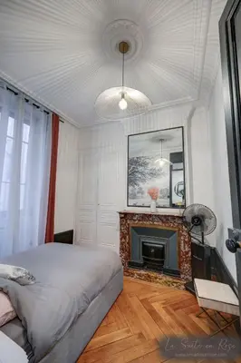 Télévision ou salle de divertissement dans l'établissement La Suite en Rose - Spa - Lyon Centre Brotteaux