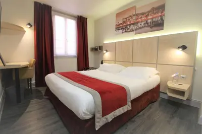 Un ou plusieurs lits dans un hébergement de l'établissement Best Western Lyon Saint-Antoine