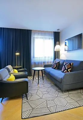 Coin salon dans l'établissement Hôtel Le Roosevelt Lyon