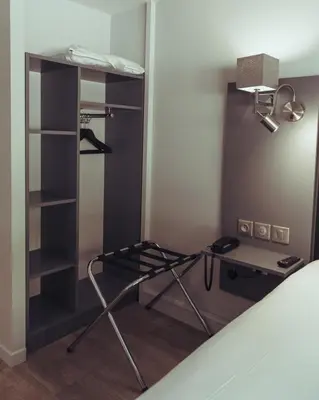 Un ou plusieurs lits superposés dans un hébergement de l'établissement Kyriad Lyon Sud Sainte Foy