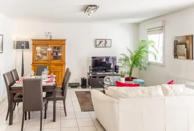 Coin salon dans l'établissement Appart'cosy Lyon Est