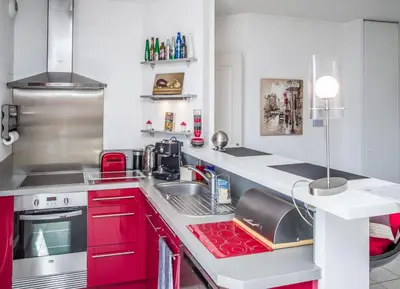 Cuisine ou kitchenette dans l'établissement Appart'cosy Lyon Est