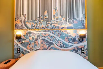 Un ou plusieurs lits dans un hébergement de l'établissement Ibis Styles Lyon Croix Rousse