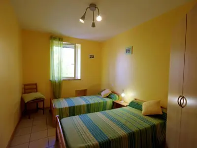 Un ou plusieurs lits dans un hébergement de l'établissement Gîte confortable 2 chambres avec animaux acceptés en pleine campagne - FR-1-496-130